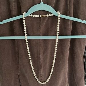 String of faux pearls Size 16”